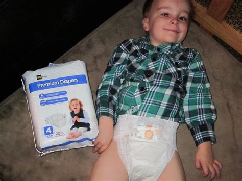 At home, he usually goes around <b>wearing</b> nothing over his <b>diaper</b>. . 7 year old wearing baby diapers